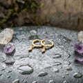 An Elegant Minimalist Gold Drop Huggie Earring Set