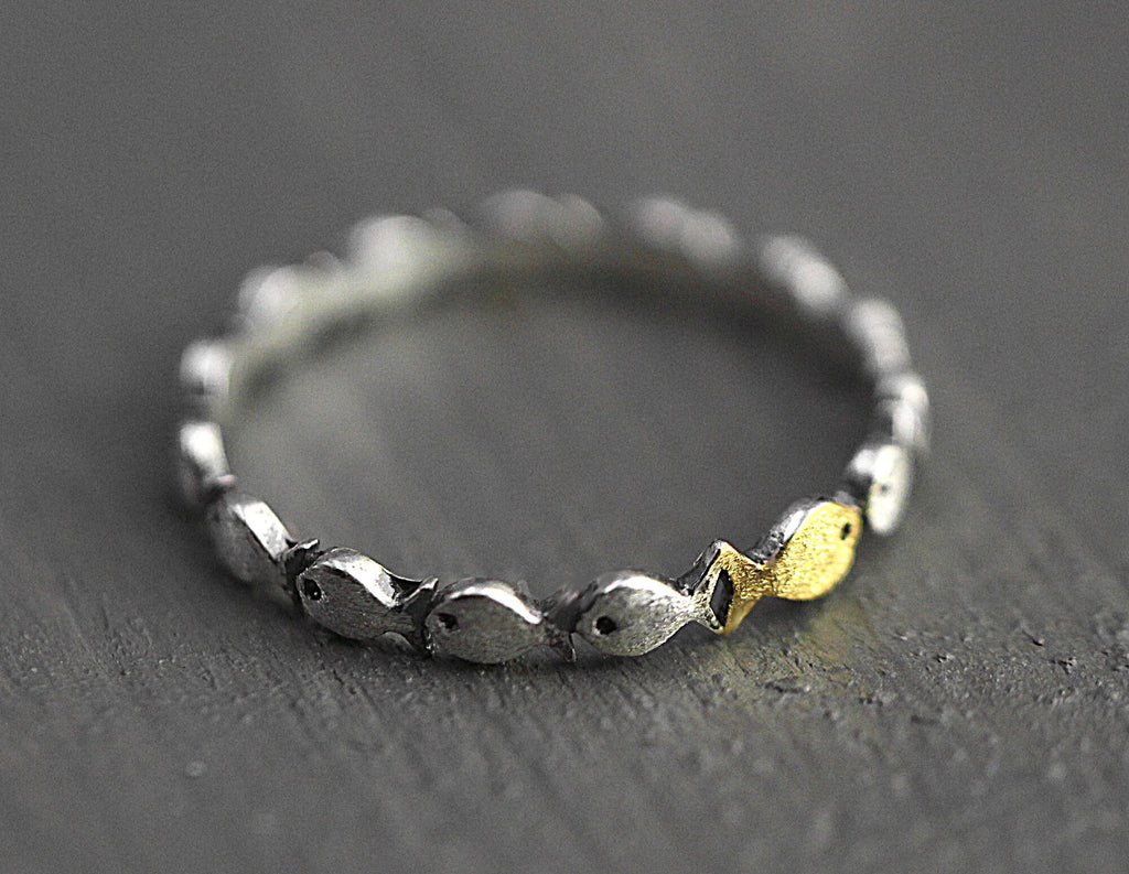 Swimming against the current. Dainty sterling silver ring. School of fish with a golden one swimming upstream. Gift for her.