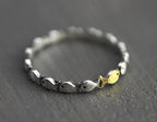 Swimming against the current. Dainty sterling silver ring. School of fish with a golden one swimming upstream. Gift for her.