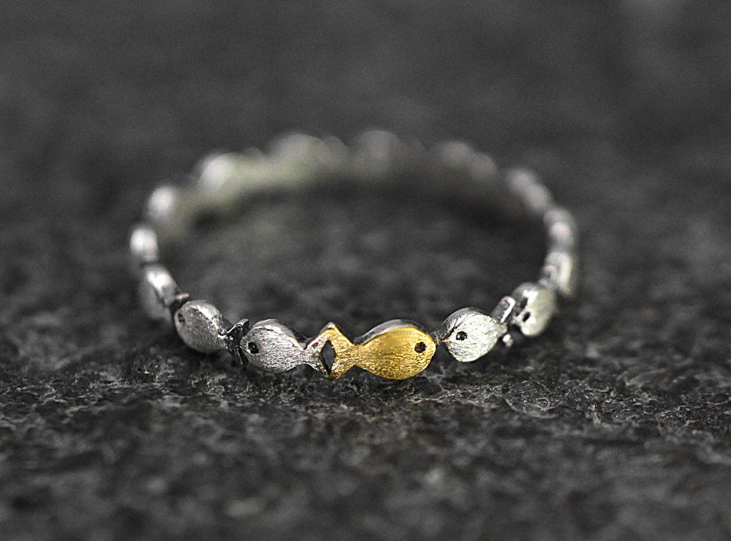 Swimming against the current. Dainty sterling silver ring. School of fish with a golden one swimming upstream. Gift for her.